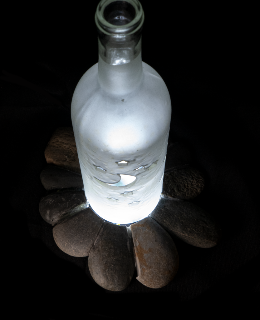 waterjet cut glass bottle