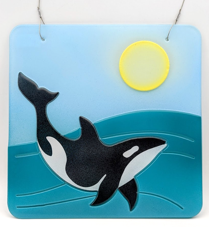 Stained Glass orca cut with a waterjet